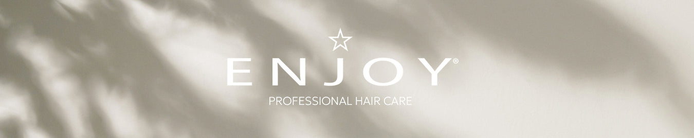 Enjoy haircare logo on a plain background with tree shadows