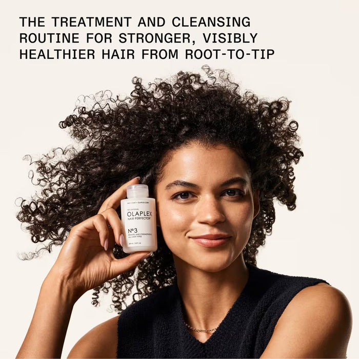 Woman holding Olaplex No.3 product with text about hair treatment routine
