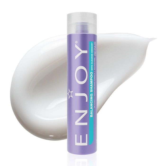Enjoy balancing shampoo in a purple shampoo bottle with a white product background