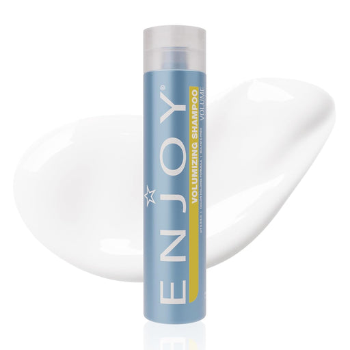Blue hair product tube labeled 'ENJOY Volumizing Shampoo' on a white background