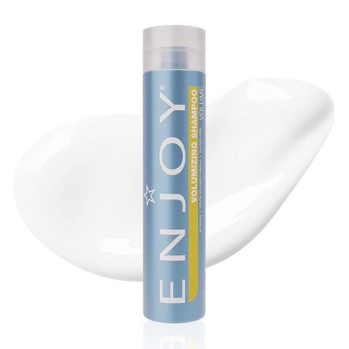 Blue hair product tube labeled 'ENJOY Volumizing Shampoo' on a white background