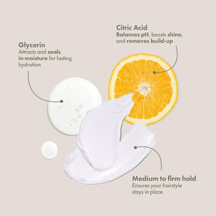 Hair product with ingredients labeled on a beige background