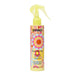 Amika Fizz-Me-Not hair product bottle with colorful yellow label on a white background