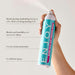 Hand holding a can of 'ENJOY' hair spray with product features listed.