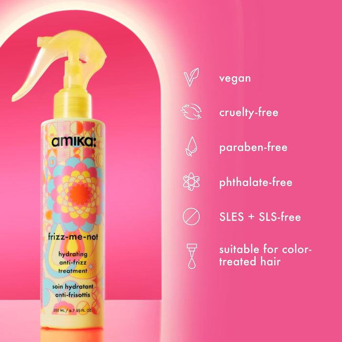 Amika frizz-me-not hair treatment spray bottle on a pink background with product features listed.