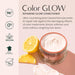 Color Glow repairing glow conditioner with lemon slices on a light pink background