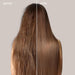 Before and after comparison of hair treatment on a person with long brown hair.