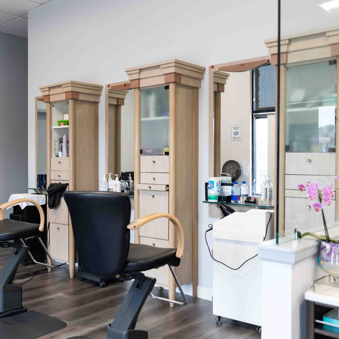 An image of the hair stations inside Han's Beauty Stør. This is where clients get haircuts, hair color applied, etc. It shows a clean and organized environment where customers can feel safe knowing we take hygiene seriously